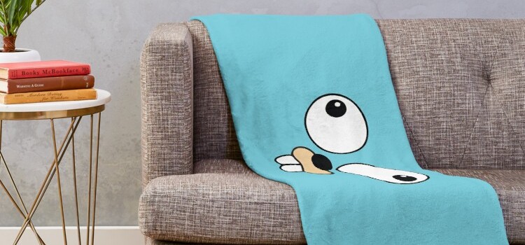 Photo of a blanket representing a Go Gopher, sold by Redbubble, covering a sofa